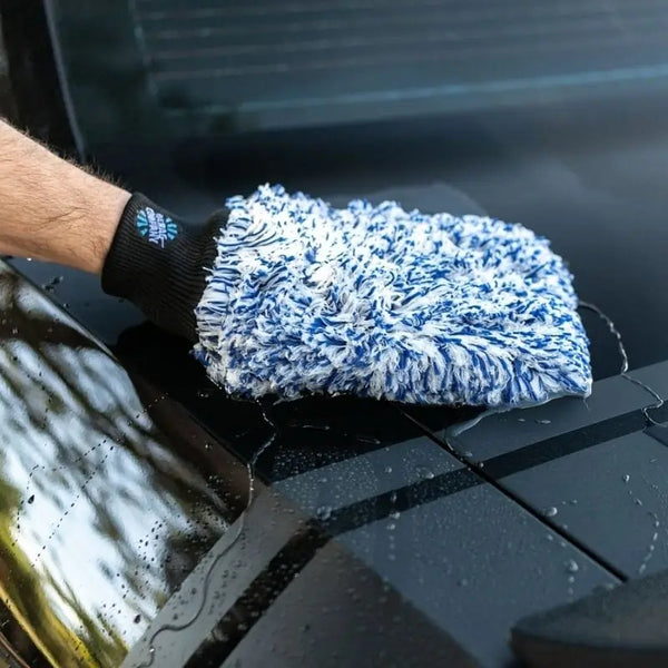 Cyclone Wash Mitt by The Rag Company washing black car
