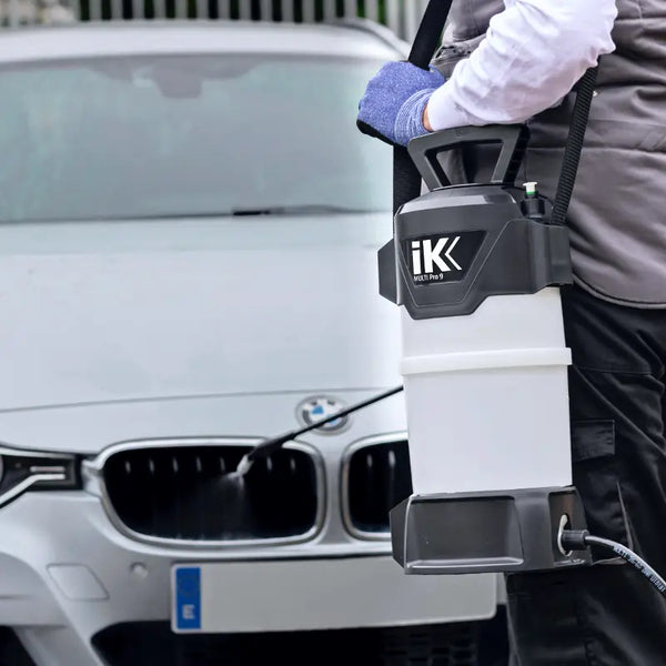 Multi Pro 9 spraying the front of a BMW car.