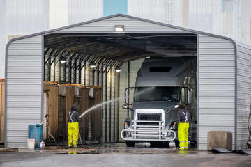 Man washing his semi-truck