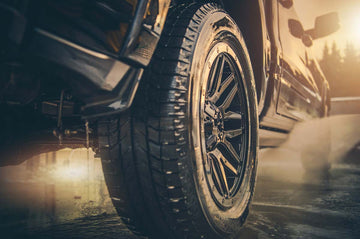 Power washing a pickup truck.