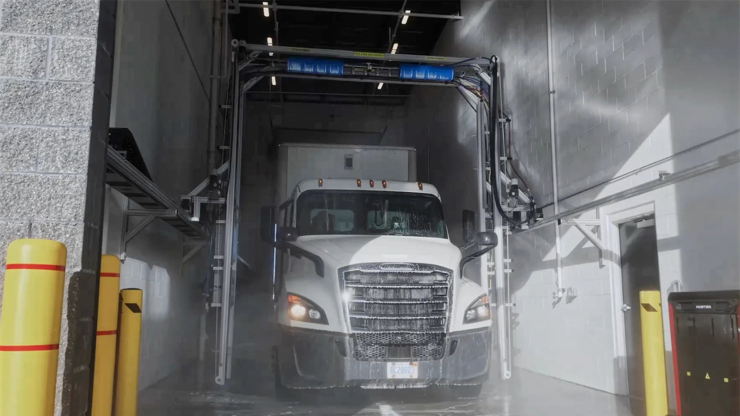 IQ Max automatic truck wash system by Image Wash Products. Equipped with 3D scanning technology to scan and wash and size vehicle.