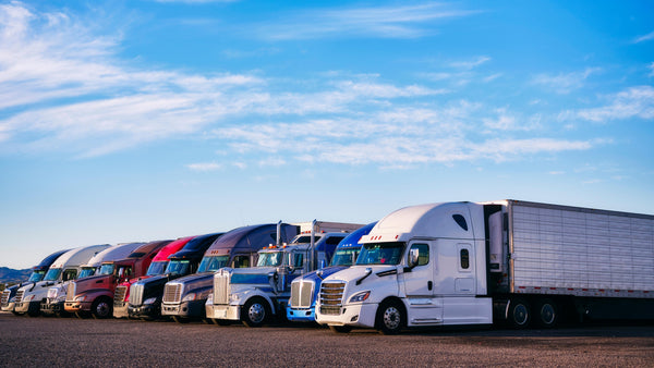 Semi Trucks Parked in sun. Image Wash Products.