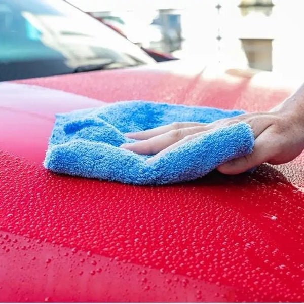 Highly absorbent Edgeless Eagle 500 drying a vehicle.