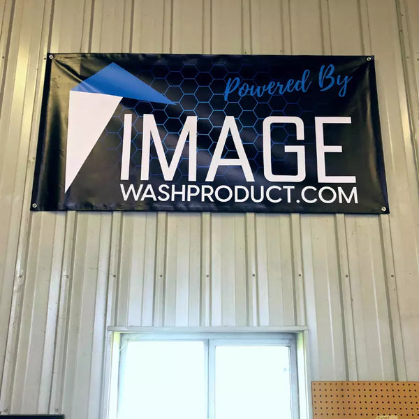 image wash products vinyl banner hung up on shop wall