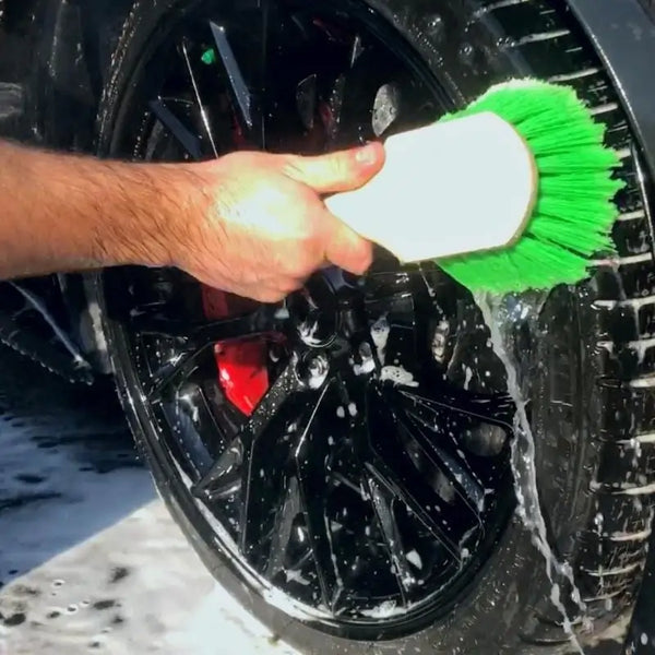 Tire Brush Aggitating a Corvette Tire With Image Wash Products